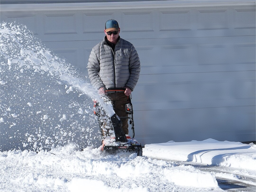Use a small gasoline snow blower in winter